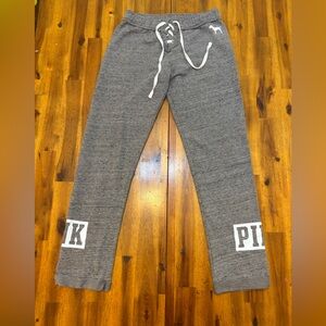 Pair of XS pink joggers Gray Sweatpants with with logo on hip